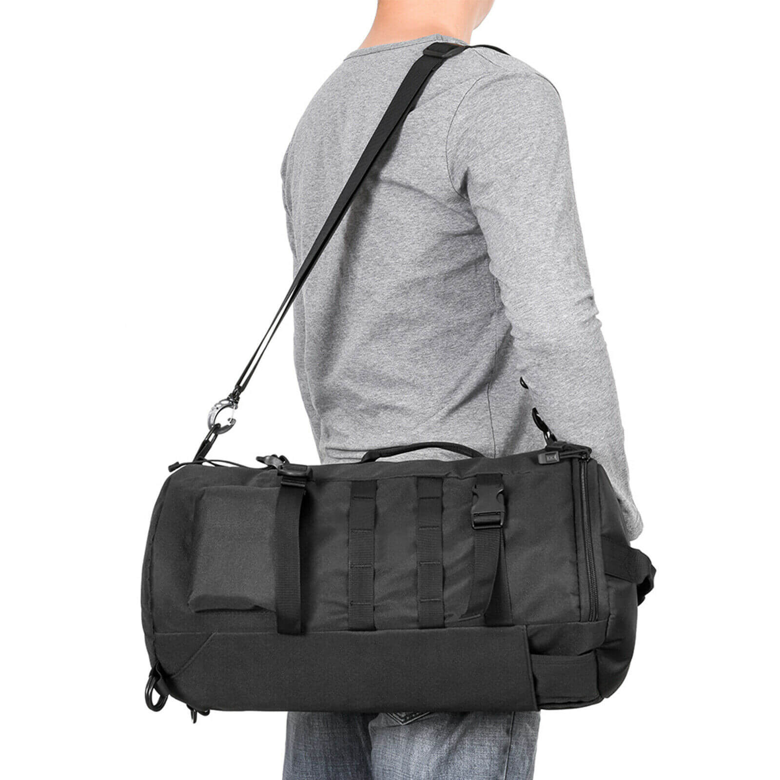 A man with a black fishing shoulder bag